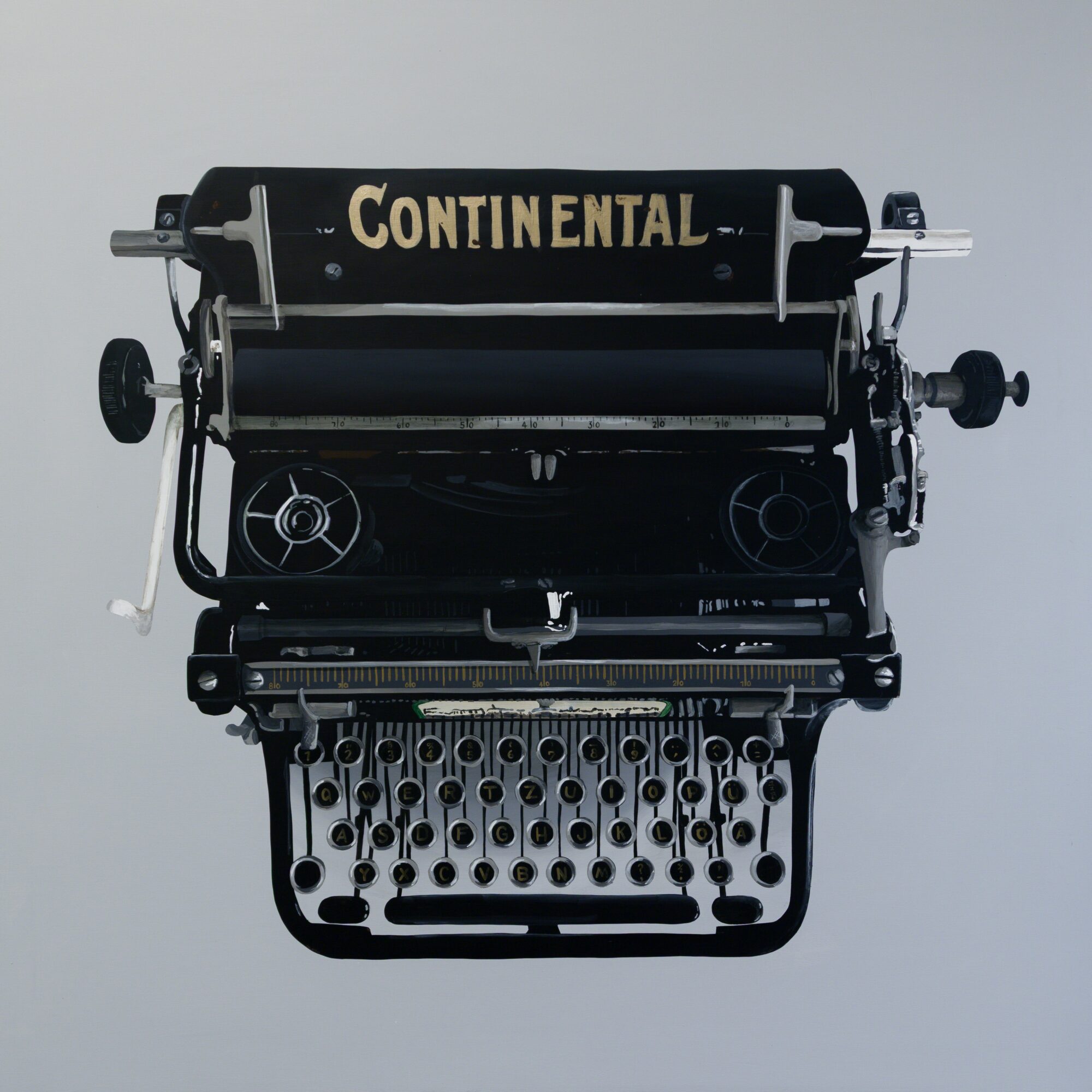 Black typewriter with 'CONTINENTAL' on the paper holder, viewed from above, against a plain background.