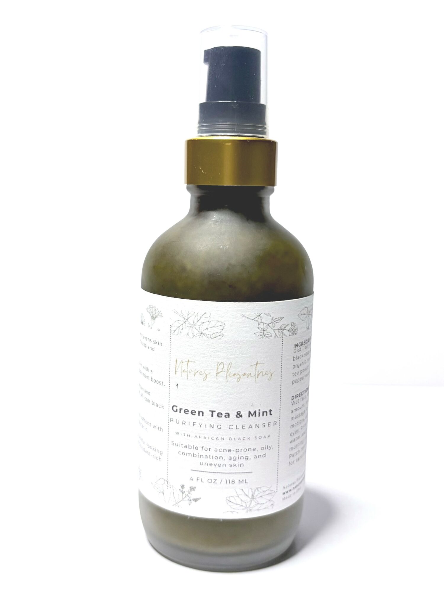 Bottle with a pump dispenser, label reads 'Green Tea & Mint', contains a skincare or cosmetic product.