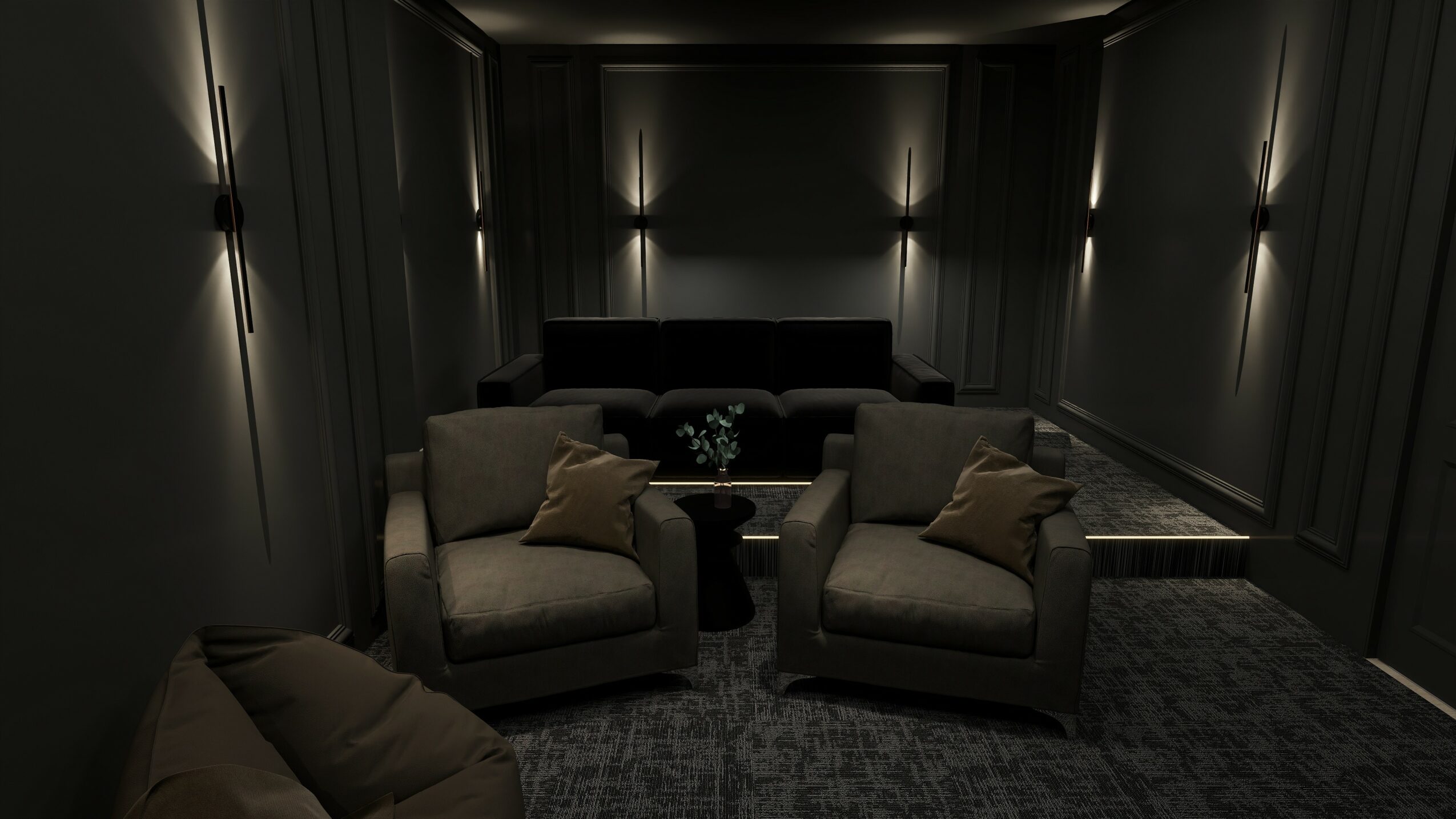 A dark, modern lounge with four armchairs, a sofa, and subdued lighting on the walls.