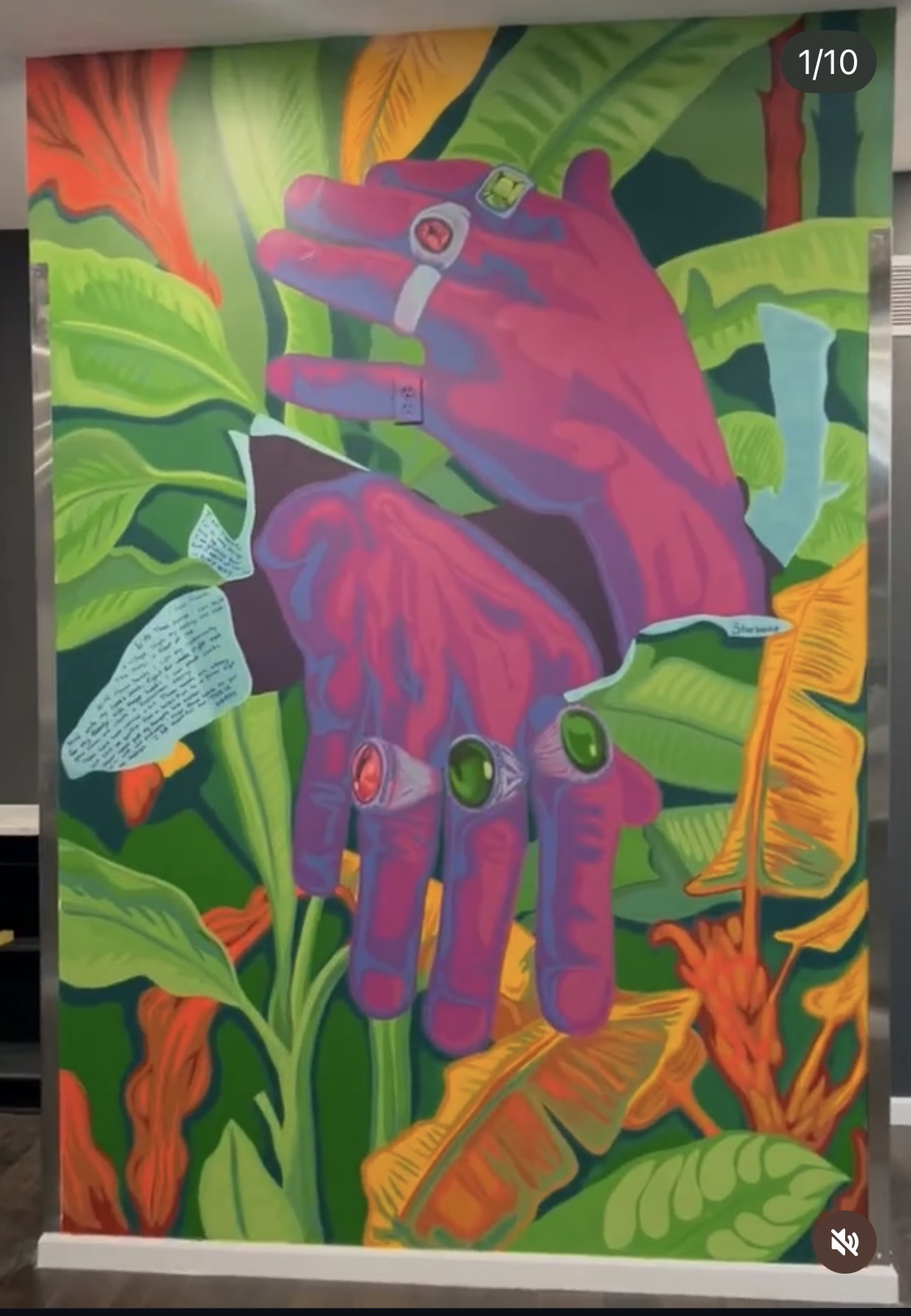 Colorful painting of two purple hands with rings among green, orange, and yellow tropical leaves and plants, with a red flower.