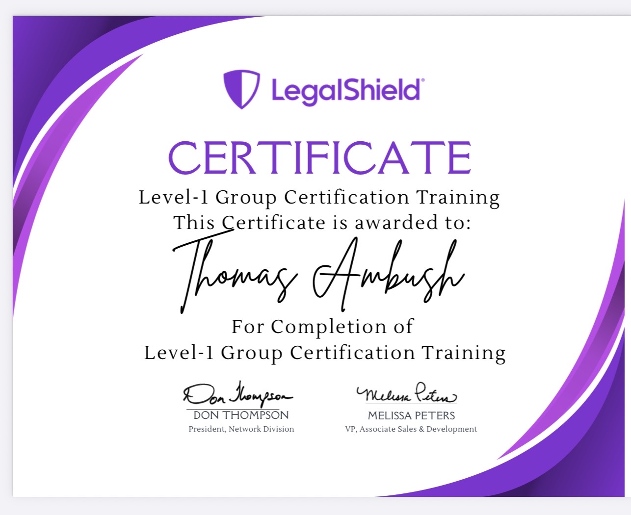 Certificate awarded to Thomas Ambush for completing Level-1 Group Certification Training, with signatures and logos, purple and white background.