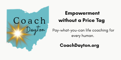 Text and logo on a white background promoting coaching services, with a starburst graphic and website URL.