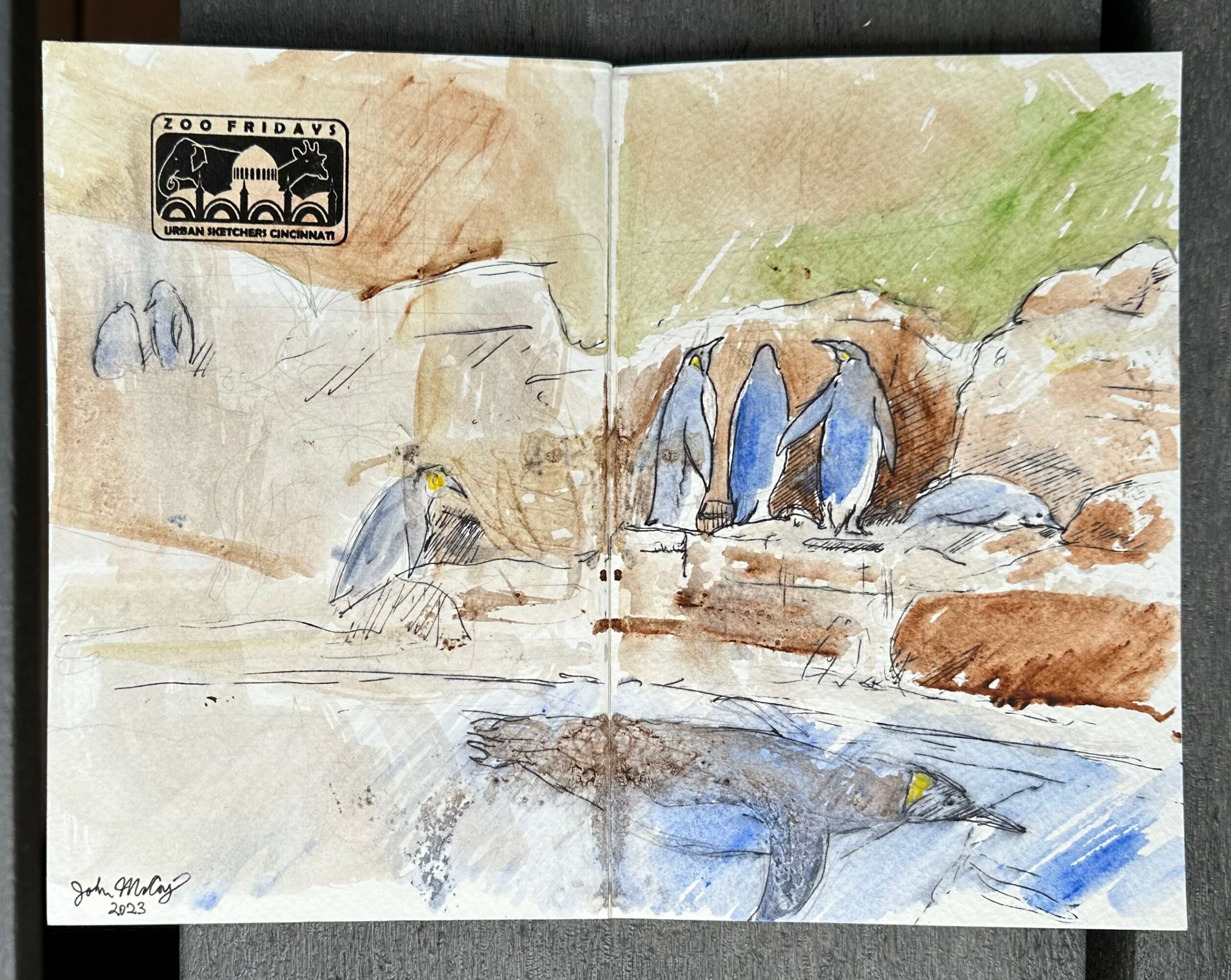 Sketch of penguins on rocks near water, with a stamp and signature on the pages, using watercolor and ink.