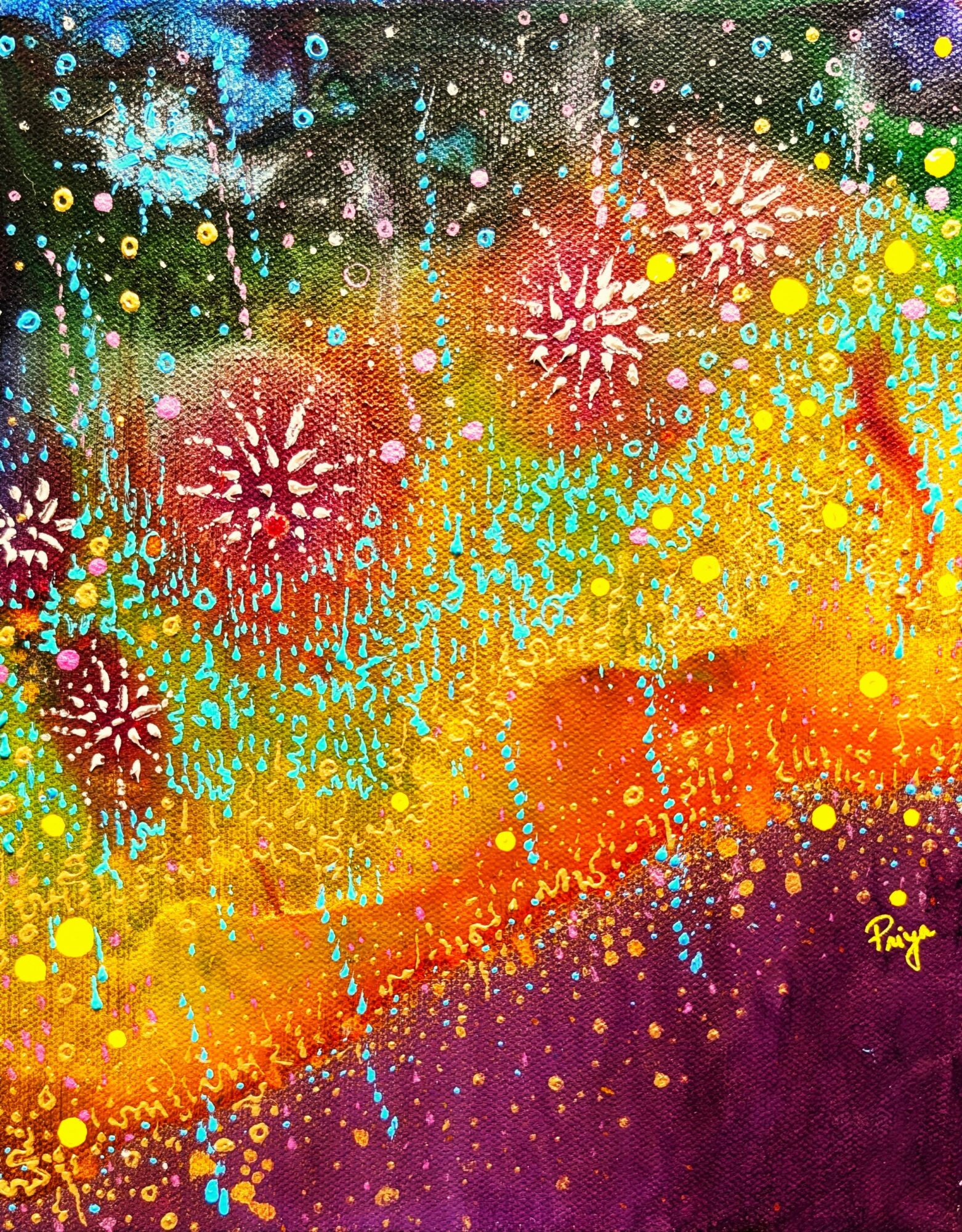 Colorful fireworks display with bright bursts of red, yellow, blue, and purple against a dark background.