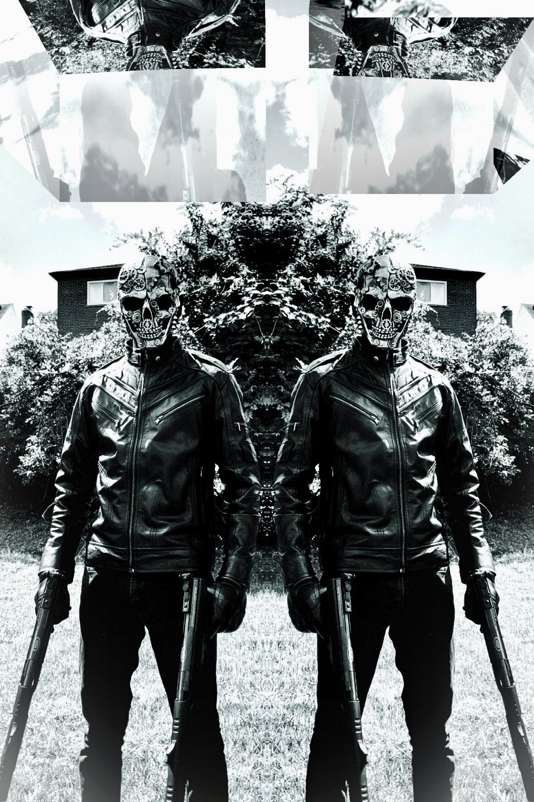 Two people in leather jackets and skull masks stand outdoors with trees and houses behind them.