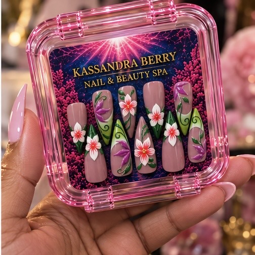 Hand holding a pink case with floral nail art designs, featuring pink, purple, and white flowers on beige nails.