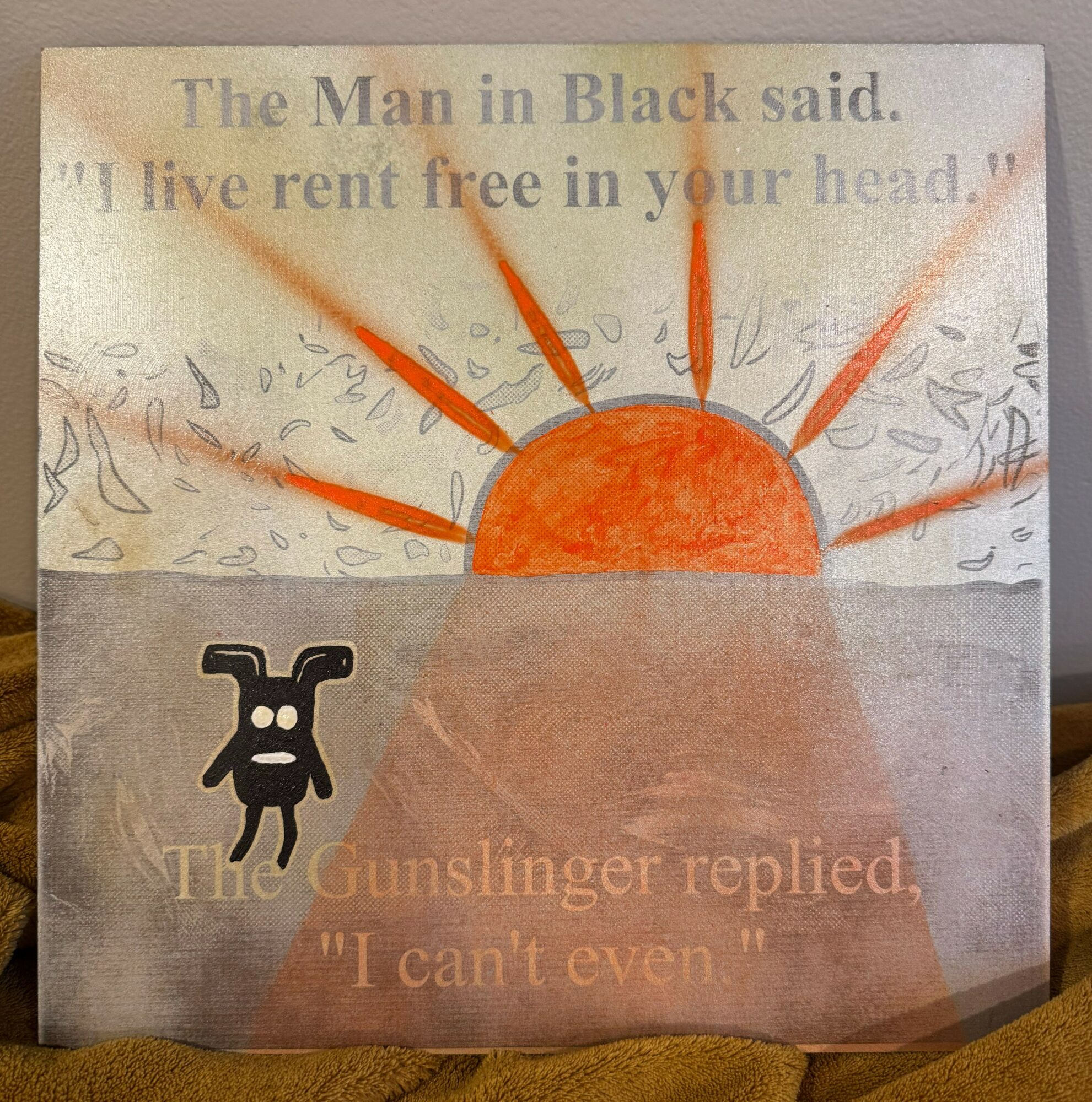Drawing of a sun rising over a horizon with a black figure and text about a man in black and a gunslinger, 20 words.